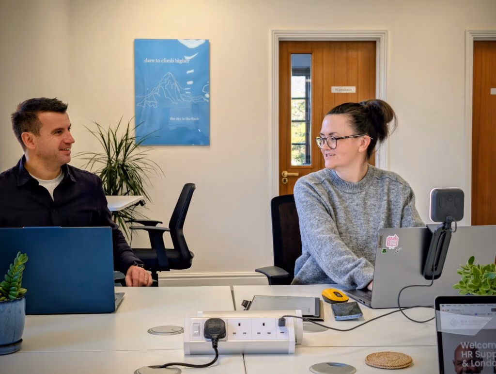 Ewen Bonnyman and Claire Cross working side by side